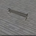 Sturdy Metal Outdoor Bench with Slatted Design on Gray Textured Tiled Floor