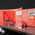 Utility Flatbed Truck With White Cab Red Cargo Container And Industrial Equipment