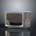 Vintage Electronic TV Set With Silver Case Antenna And Control Knobs