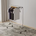 Metal Clothes Rack With Wheels Hanging Casual T Shirts In Indoor Room