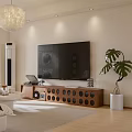 Modern Open Plan Living And Dining Room With White Sofa Decorative Paintings And Monstera Plant