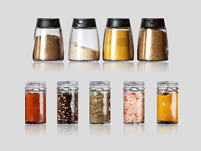 Assorted Spice Jars with Black and Clear Lids Containing Various Seasonings 3d model