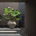 Two Vases With Lotus Leaves And Green Foliage On Stone Steps Against Wooden Slat Wall