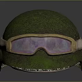 Green Moss Covered Helmet With Attached Goggles Worn And Cracked Design