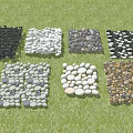 Beautiful Various Pebble Combinations in Paved Squares with Green Grass Background