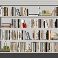 Organized White Bookshelf With Book Collection Decorative Items Green Apples And Red Vase