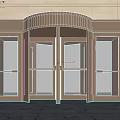 Golden Revolving Door Entrance With Glass Panels And Stone Facade Design