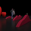 Red Heart Sculptures And Wave Structures Photo Spot For People Taking