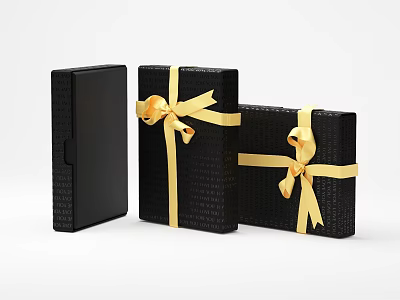Elegant Black Jewelry Boxes With Gold Ribbon Bows And Textured Surface Details 3d model