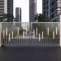 Modern Metal Entrance Gate With Vertical Slats High Rise Buildings And Green Plants
