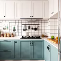Modern White and Teal Kitchen Cabinets with Tiled Walls and Cooking Utensils