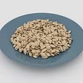 Raw Pumpkin Seeds on a Blue Plate as Healthy Snack Option
