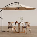 Modern Outdoor Cantilever Patio Umbrella Over Wooden Table And Chairs With Flower Vase