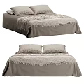 Cozy Double Bed With Gray Bed Sheet Fringed Blanket And White Pillows