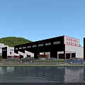 Industrial Factory Complex With Multiple Buildings Green Hills And Water Area