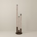 Modern Floor Lamp With Three Light Poles of Different Heights and Dark Base