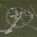 Futuristic Circular Complex Aerial View With Central Tower And Radial Roads On Green Grassland