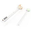 Household Mixing Sticks With Colored Tops And Black Label Handle Design