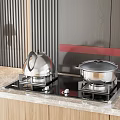 Modern Kitchen Appliance Gas Stove With Stainless Steel Pots Kettle On Marble Countertop