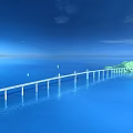 Long Bridge Over Blue Ocean Connecting Green Island With Sailboats And Clear Sky