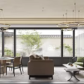 Modern Living Dining Area With Circular Pendant Lights Large Windows Beige Sofa And Green Armchair