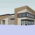 Modern Commercial Complex Featuring Glass Facade And Multi Story Mixed Material Exterior