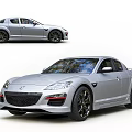Silver Mazda Sports Car With Sleek Body Design And Black Alloy Wheels