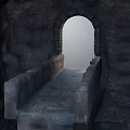 Ancient Stone Archway With Narrow Illuminated Passage And Rough Rock Walls