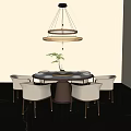 Modern Round Dining Table Set with Six White Chairs Central Green Plant and Pendant Light