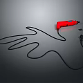 Red Electric Drill with Black Cord Formed as Hand Shape on Gray Background