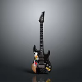 Black Electric Guitar With Colorful Stickers Sleek Body And Modern Design