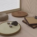 Woven Round And Square Floor Cushions With Tea Cups On Wooden Floor Near Window