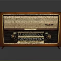 Vintage Electronic Radio With Wooden Case And Classic Tuning Knobs