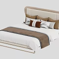 Modern Double Bed with Beige Headboard Multiple Pillows and Brown White Striped Blanket