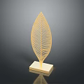 Golden Leaf Shaped Furniture Decor Piece With Intricate Veins And Square Base