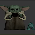 Green Character Figurine With Large Ears Brown Cloak Holding Small Object And Green Frog Figurine