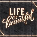 Stylish Lighting Combination With Golden Neon Frame Black Stone Wall And LIFE is beautiful Lettering
