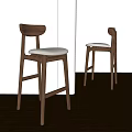 Modern Wooden Bar Stools With Upholstered Seats In Light Interior Space Design