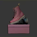 Pink Dr. Martens Boots On Pink Box With Blue Pair And Brand Logo