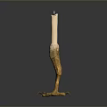 Gold Claw Base Candle Holder With White Candle And Metallic Design