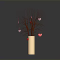Sculptural Carving of Light Colored Cylindrical Vase with Branches and Red Pink Heart Decorations on Dark Background