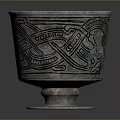Intricate Carved Silver Cup With Traditional Sculptural Patterns And Artistic Designs