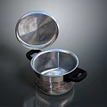 Aluminum Cooking Pot With Open Lid Black Handles And Patterned Exterior