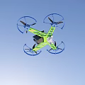 Green And Blue Quadcopter Drone With Four Propellers And Protective Guards 3d model