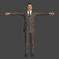 Man in Double Breasted Suit Standing with Arms Outstretched Against Gray Background