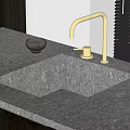 Modern Grey Stone Washbasin Interior With Brass Faucet And Small Decorative Bowl