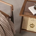 Wooden Side Table with Rattan Detail Featuring Coffee Cup and Book in Cozy Living Room
