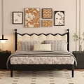 Double Bed With Black Scalloped Headboard Plaid Pillows Floral Bedspread Nightstands And Decorative Wall Art