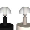 Modern Minimalist Table Lamps with Black and White Bases Transparent Glass Shades and Sleek Design