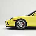 Yellow Sports Car in Side View with Black Windows Silver Wheels and Red Brake Calipers